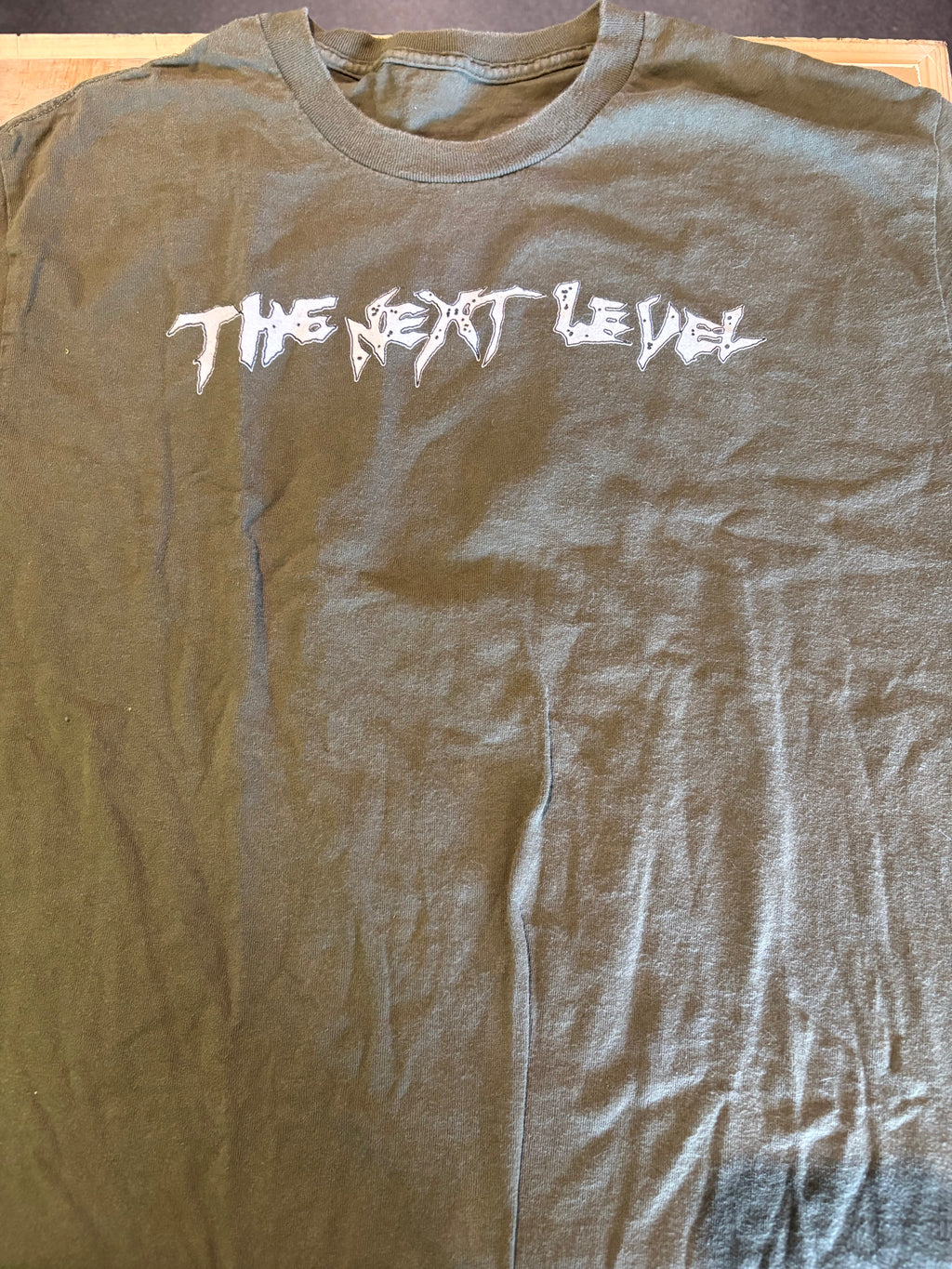 The Next Level Text Logo T-Shirt, Green, L-BoldPlay